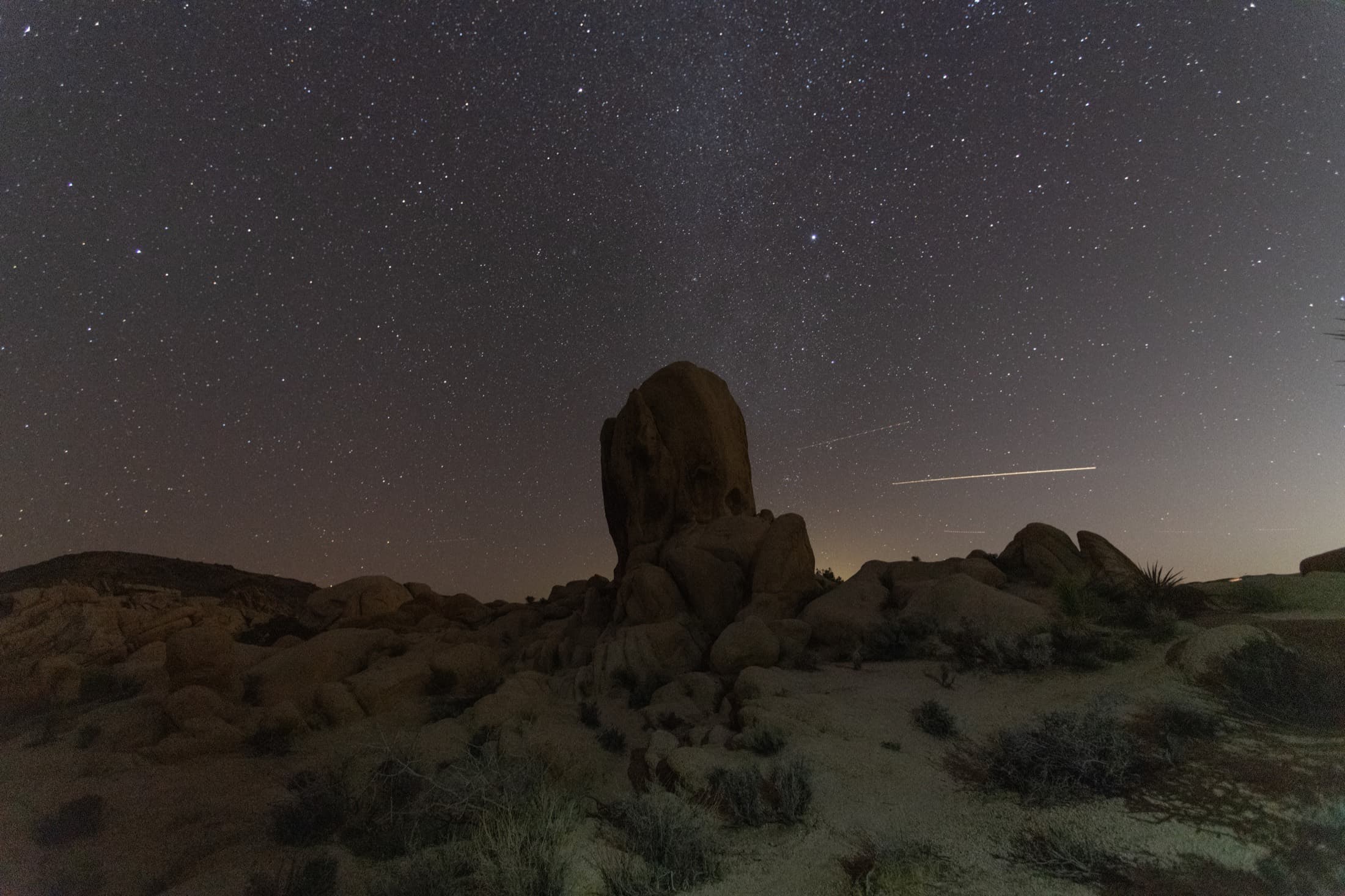 Night sky over desert landscape